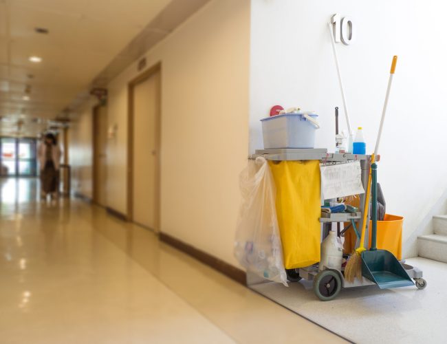 Cleaning tools cart wait for maid or cleaner in the hospital. Bucket and set of cleaning equipment in the hospital. Concept of service, worker and equipment for cleaner and health